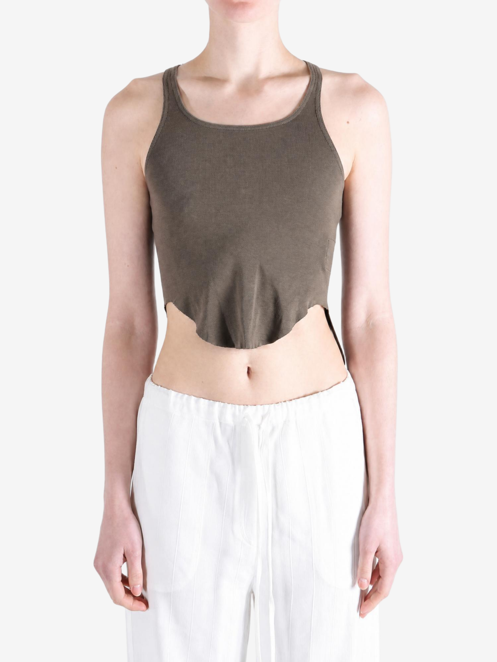 Brown top worn by a person, showing the top fit