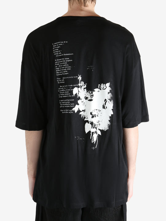 Black T-shirt worn by a person, showing the T-shirt fit