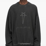 Black t-shirt worn by a person, showing the t-shirt fit