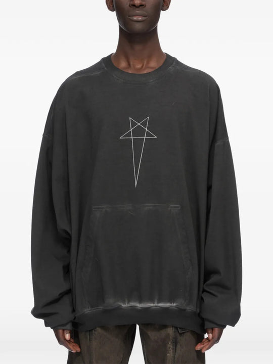 Black t-shirt worn by a person, showing the t-shirt fit