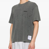 Black t-shirt worn by a person, showing the shirt's fit