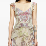 Brown knitwear worn by a person, showing the knitwear's fit