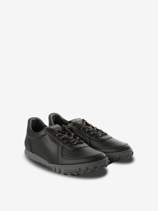 Black sneakers, side view