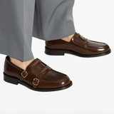 Brown shoes worn by a person, showing the shoes fit