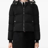 Black jacket worn by a person, showing the jacket fit