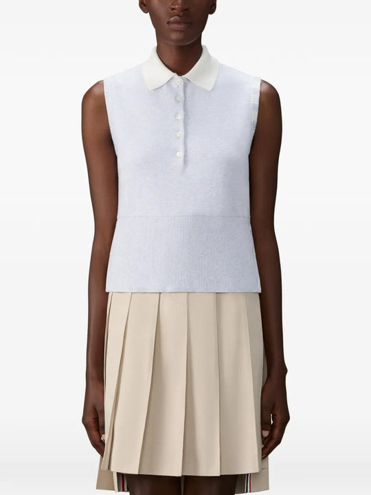 Grey shirts worn by a person, showing the shirts fit