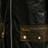 Close up of Brown jacket, showing texture of the 100% cotton fabric