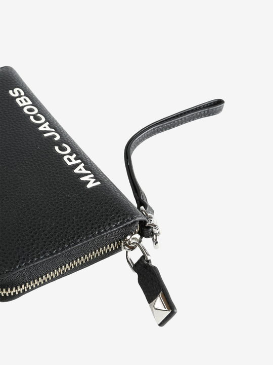 Close up of black wallet,showing texture of the leather fabric