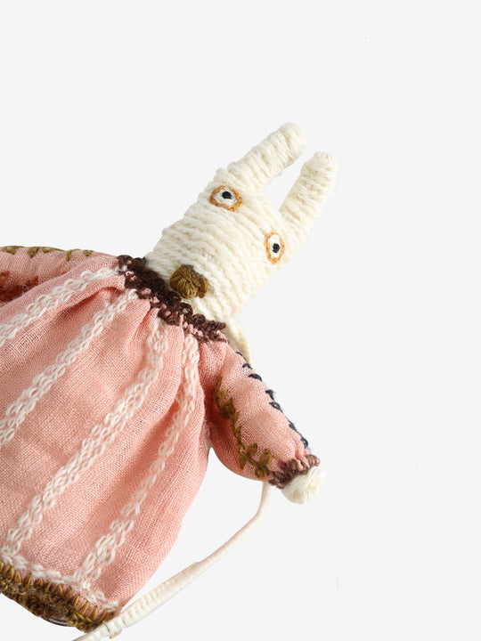 Close up of pink doll,showing texture of the wool fabric