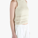 White vest worn by a person, showing the vest's fit