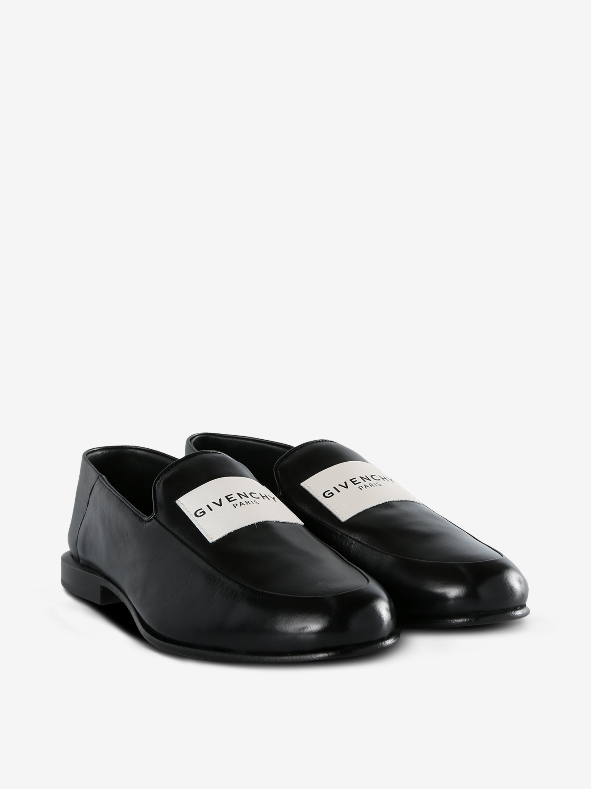 Black loafer, side view