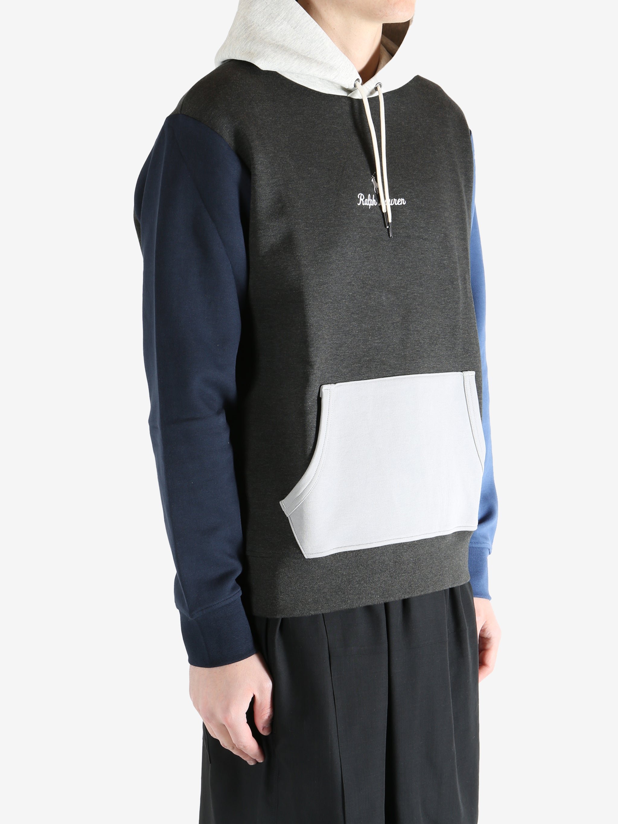 Color-blocked hoodie worn by a person, showing the hoodie fit