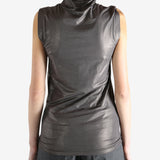 Grey tops worn by a person, showing the tops fit