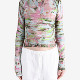 Pink top worn by a person, showing the top fit