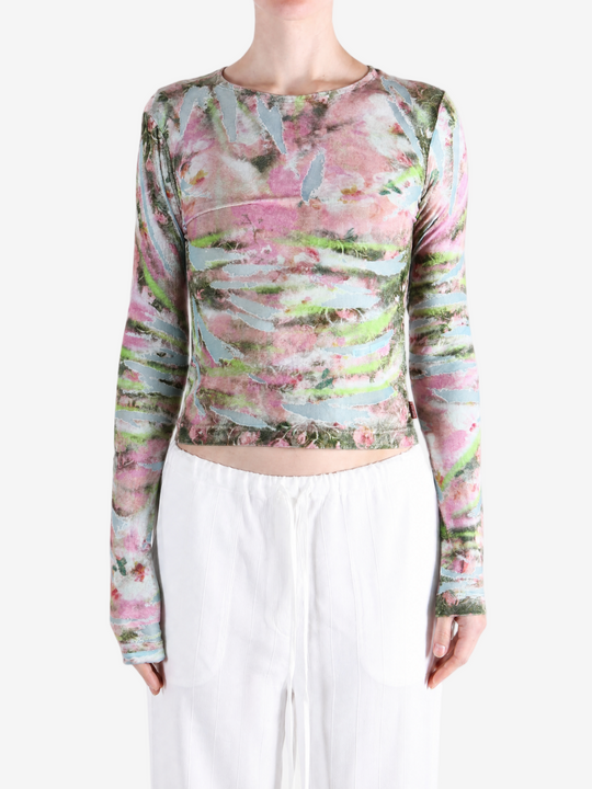 Pink top worn by a person, showing the top fit