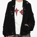 Black hoodie worn by a person, showing the hoodie fit