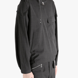 Black jackets-coats worn by a person, showing the jackets-coats's fit