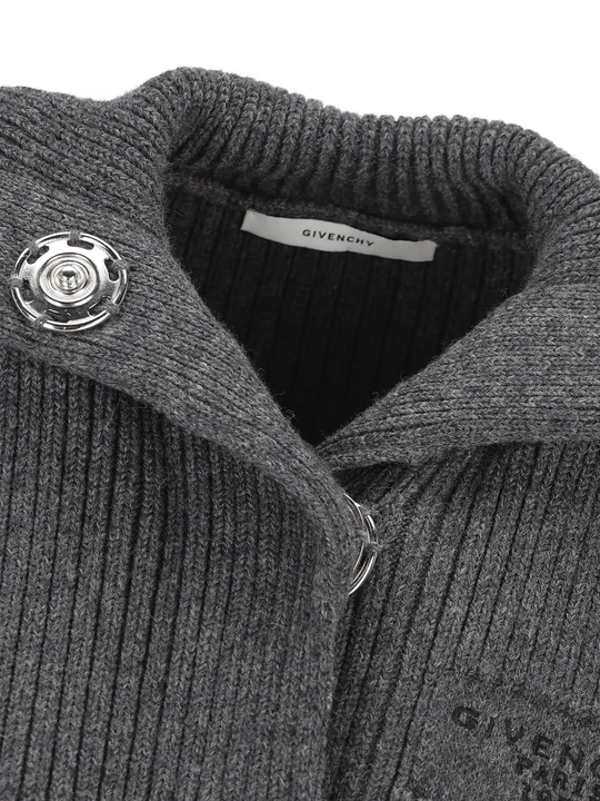 Close up of grey tops, showing texture of the wool and alpaca wool fabric