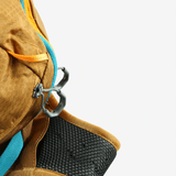 Close up of the tan backpack, showing texture of the polyester fabric