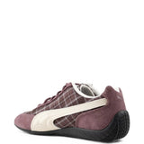 Burgundy shoes, side view