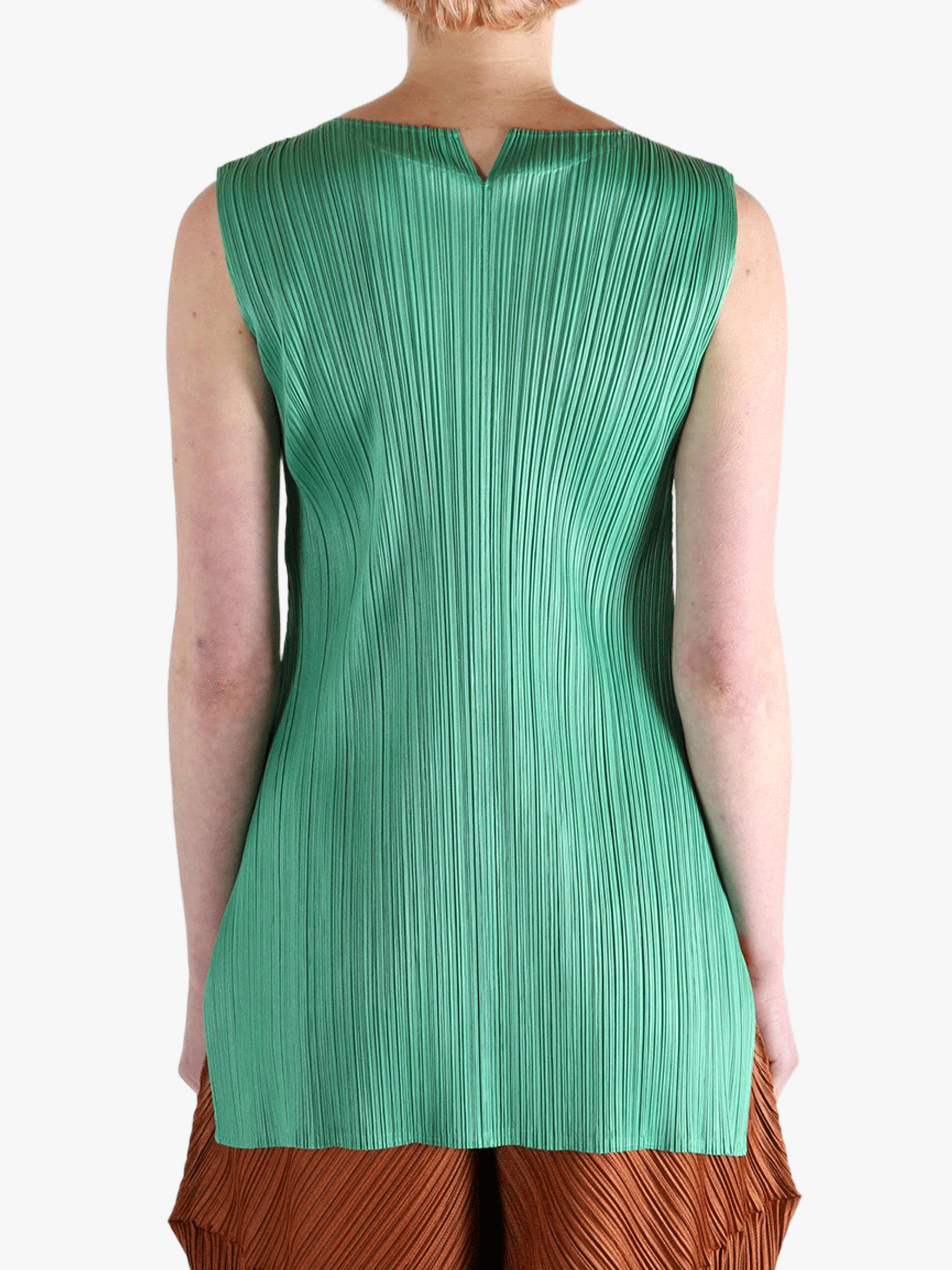Green dress worn by a person, showing the dress's fit