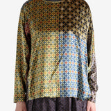 Yellow shirt worn by a person, showing the shirt's fit