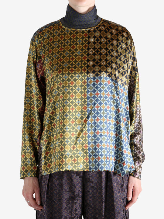 Yellow shirt worn by a person, showing the shirt's fit