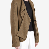 Tan jacket worn by a person, showing the jacket fit