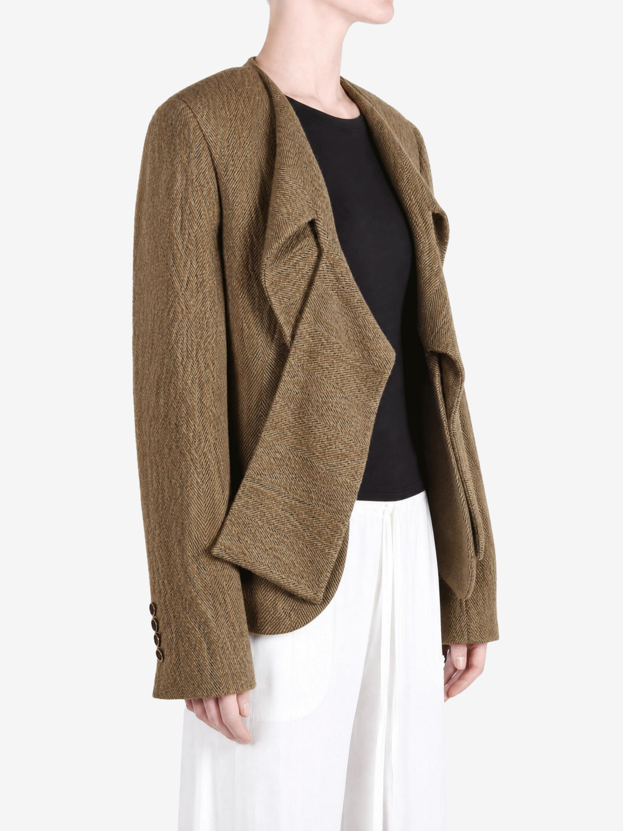 Tan jacket worn by a person, showing the jacket fit