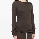 Brown skirts worn by a person, showing the skirts fit