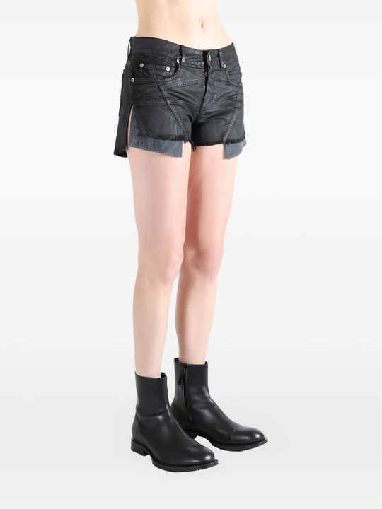 Black short worn by a person, showing the fit