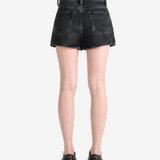 Black skirt worn by a person, showing the skirt fit