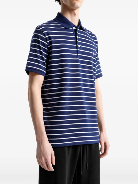 Blue t-shirt worn by a person, showing the t-shirt fit