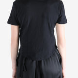 Black t-shirt worn by a person, showing the shirt's fit