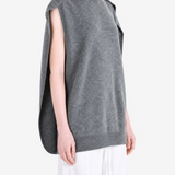Grey dress worn by a person, showing the dress fit