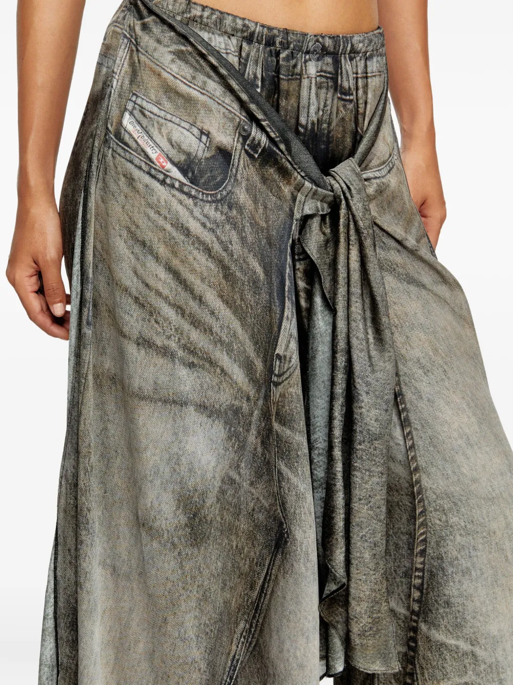 Close up of the black pants, showing texture of the viscose fabric