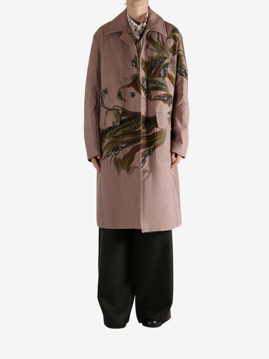 Pink coat worn by a person, showing the coat's fit