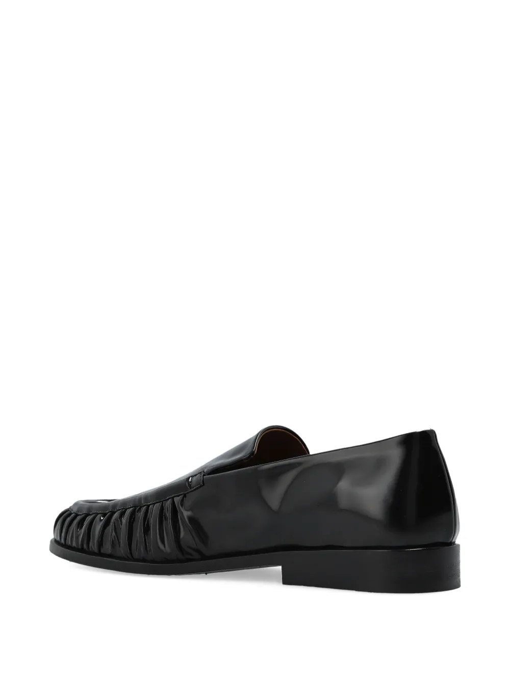Black loafer, back view
