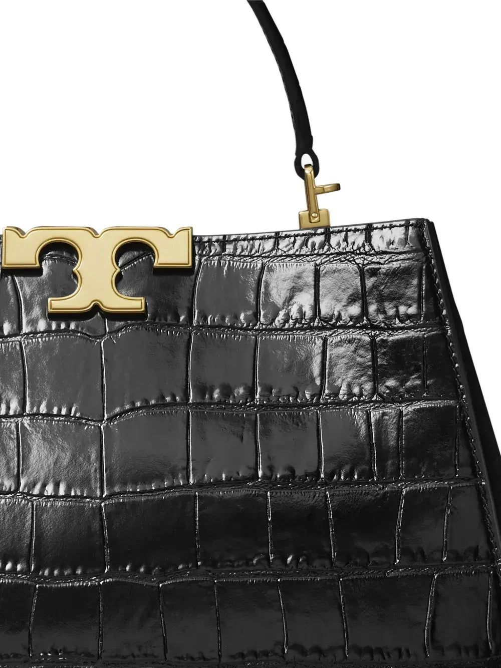 Close up of black bag, showing texture of the leather fabric