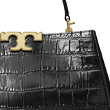 Close up of black bag, showing texture of the leather fabric