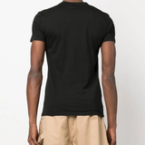 Black t-shirt worn by a person, showing the t-shirt's fit