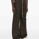 Brown pants worn by a person, showing the pants' fit