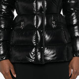 Black jacket worn by a person, showing the jacket fit