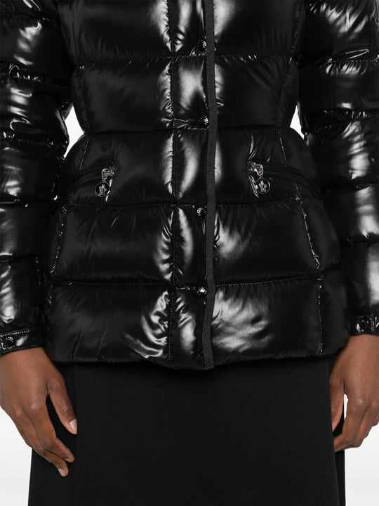 Black jacket worn by a person, showing the jacket fit