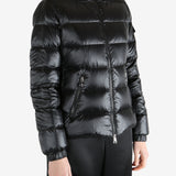 Black jackets-coats worn by a person, showing the jackets-coats fit