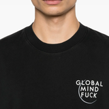 Close up of black t-shirt, showing texture of the Cotton fabric