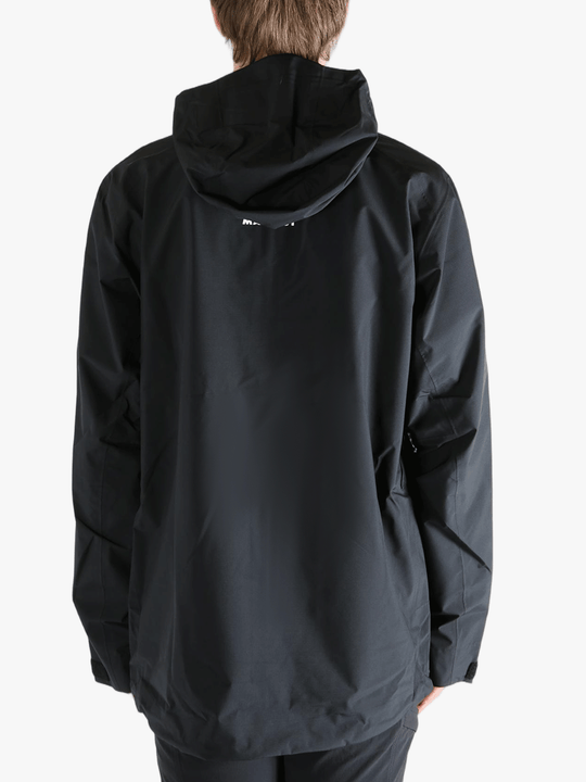 Black jacket worn by a person, showing the jacket fit