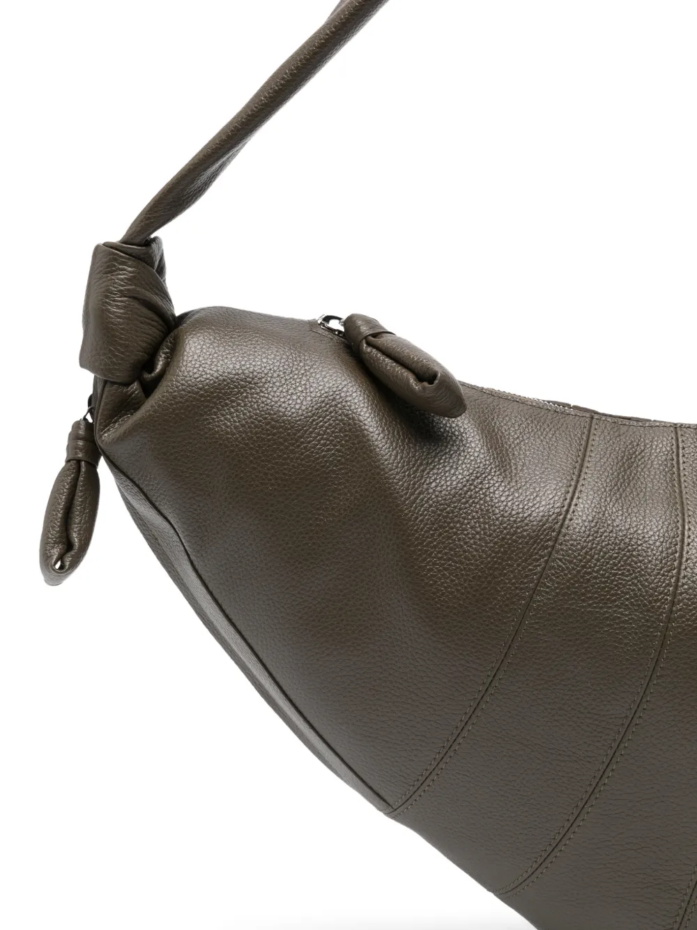 Close up of green bag, showing texture of the Calf Leather fabric
