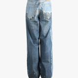 Blue jeans worn by a person, showing the jeans fit