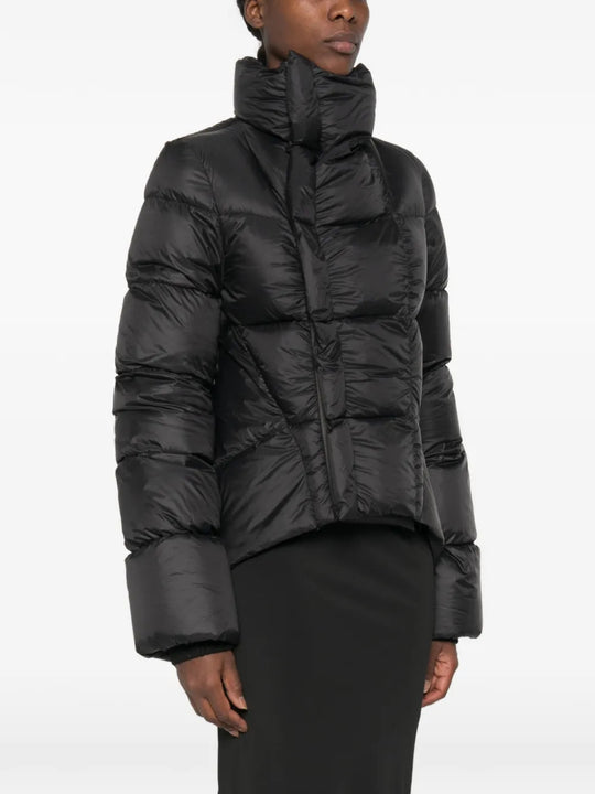 Black jacket worn by a person, showing the jacket fit